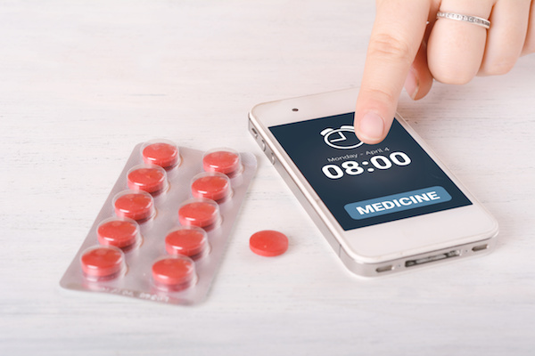 Mobile phone alarm with timer for pills